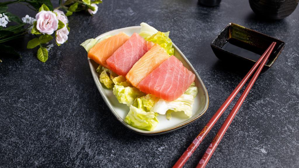 Smoked Salmon Sashimi · Six pieces of smoked salmon sashimi.