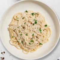 Chicken Alfredo Pasta · Classic alfredo sauce, served over fettuccine pasta cooked with grilled chicken.