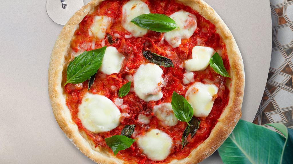 Margherita Pizza · Mozzarella, fresh tomato sauce, basil, and extra-virgin olive oil baked on a hand-tossed dough.