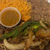 Platillo De Carne Al Gusto & Arroz Y Frijoles · The meat of your choice: serves with rice and beans.