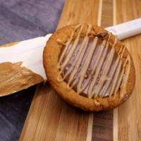 Peanut Butter Cookie Cup · Peanut butter cookie filled with chocolate and garnish with peanut butter. OMG.