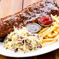 El Jefe’S Ribs · Baja baby back ribs, layered with bbq sauce and coleslaw, french fries.
