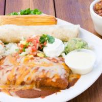 Plato Vaquero · Cheese enchilada, ground beef enchilada with gravy, pork tamale, beef fajita taco, a cup of ...