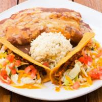Plato Guzman · Ground beef enchilada, Shredded chicken enchilada covered in chili gravy and a crispy ground...