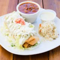 Chimi & Changa · Flour tortilla filled with shredded chicken, cheese and crisped to perfection – dressed with...