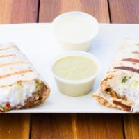 Mexican Wrap · Flour tortilla stuffed with your choice of meat, lettuce, Aguirre's rice, beans, guacamole, ...