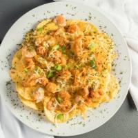 N'Awlins Seafood Nachos · Tasty Tortilla Chips Topped With Sautéed Crawfish, Smoked Gouda Cheese, Cheddar Queso, Shred...