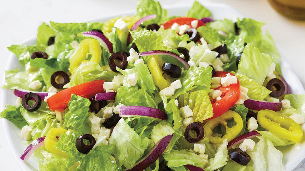 Family Greek Salad · Fresh-cut lettuce blend, feta cheese crumbles, black olives, sliced tomatoes, red onions, and banana peppers; served with Greek dressing. Regular: 210 cal.; 110 cal. per serving, family: 380 cal.; 100 cal. per serving.