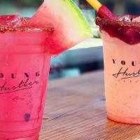 Lime Aguas Frescas  · Fresh squeezed Limeade served over ice, with a rim of Watermelon Chamoy and Tajin