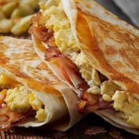 Breakfast Tacos · Flour Tortilla, One Scrambled Egg and Cheddar Cheese, with an Avocado Slice. Add Sausage, Ba...