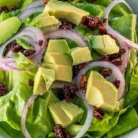 Butter Lettuce Salad · Avocado, red onion, and candied pecans with champagne vinaigrette.. Contains: allium, tree n...
