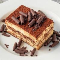 Tiramisu · Traditional lady fingers dipped in coffee and brandy layered with sweetened mascarpone finis...