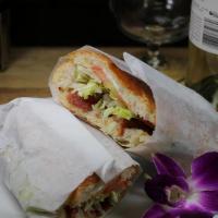 Blt Sandwich · Cuban bread, mayonnaise, bacon, lettuce, and tomato.