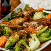 Teriyaki Chicken · Grilled chicken and vegetables tossed in teriyaki sauce. Served with your choice of steamed ...