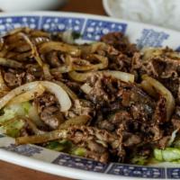 Stir-Fried Black Pepper Beef · Served with your choice of steamed rice or vermicelli.