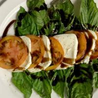 Caprese · Layers of fresh Mozzarella, Roma Tomatoes, and Basil Leaves then finished with Balsamic Redu...