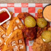  Chicken And Waffles With Fries  · 2 tenders, 1 waffles, pickles, syrup and butter