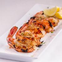 Half Pound Grilled Shrimp · Half Pound of Garlic Butter Marinated Shrimp, Grilled and served with Choice of 2 Side Sauces.