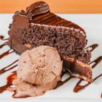 Ultimate Chocolate Cake · Chocolate cake with layers of chocolate mousse, chocolate ganache, chocolate sauce, & chocol...