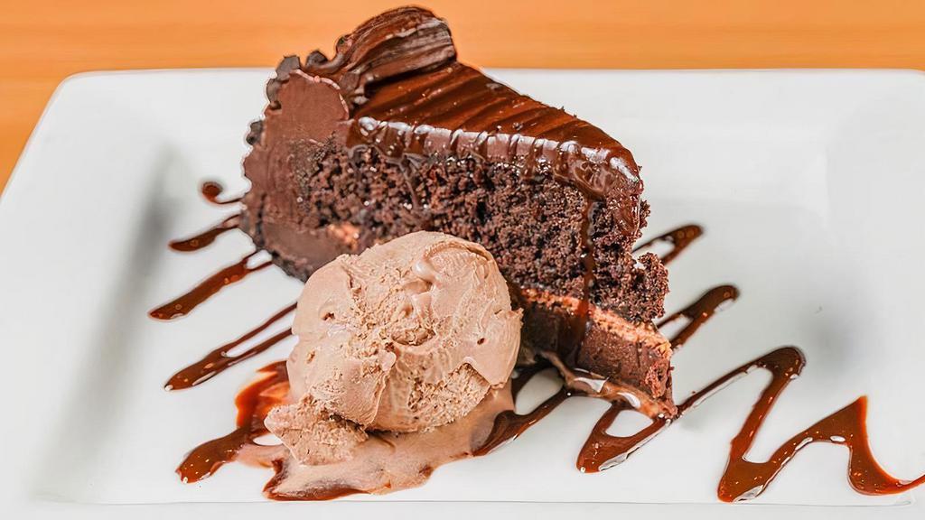 Ultimate Chocolate Cake · Chocolate cake with layers of chocolate mousse, chocolate ganache, chocolate sauce, & chocolate hazelnut gelato.