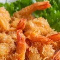 Camarones Empanizados (Breaded Shrimp) · Servido con arroz, frijoles y ensalada. Served with rice, beans and salad.