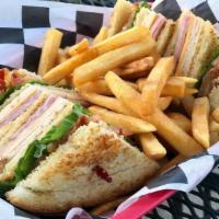 Texas Club · Ham, turkey, bacon, American cheese, . Swiss cheese, lettuce, tomato, and mayo on toasted so...