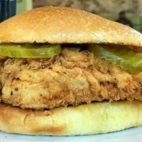 Crispy Chicken Sandwich · Our huge marinated chicken breast, hand battered and fried to a golden crisp. Served on our ...