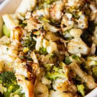 Broccoli & Cauliflower (Dd) · Broccoli and cauliflower, roasted with garlic and olive oil. Topped with balsamic glaze and ...
