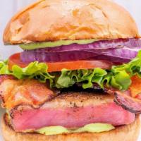 Tuna Steak · Cajun-spiced, bacon, wasabi mayo, lettuce, tomato, onion.
