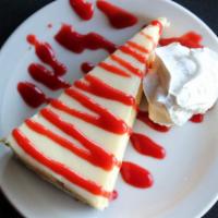 Cheesecake · NY style cheesecake. Strawberry or chocolate sauce available upon request.