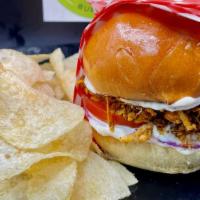 Kc Classic Chicken Burger · Ground chicken meat cooked with spices, assembled with freshly cut red onion and tomatoes, t...