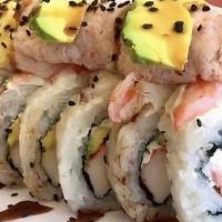 Culiacancito Roll · Boiled shrimp, imitation crab, cream cheese topped with avocados, cucumbers, and marinated c...