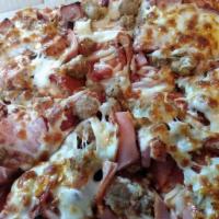 Meat Supreme Pizza · Pepperoni, italian sausage, beef, ham, canadian bacon, meat sauce and meatballs.