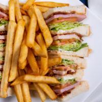 Club Sandwich · Ham, Turkey, Bacon, Lettuce, Tomato, dill Pickles, Mayonaise, French Fries