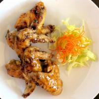 Peek Gai Tod - Chicken Wings · Gluten-free. Whole chicken wings marinated and deep-fried; seasoned with Thai chili powder.
