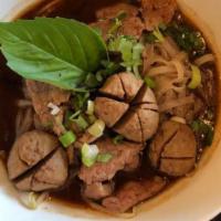 Bangkok Beef Noodle Soup · Rice noodles in pork broth with beef slices, bean sprout, and thai basil topped with cilantr...