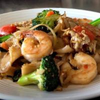 Pad Kee Mao (Drunken Noodle) · Stir-fried broad rice noodles with egg, thai basil, broccoli, bell pepper, tomato, carrot, g...