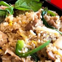 Ka Prow Fried Rice (Basil Fried Rice) · Stir-fried rice with egg, thai basil leaves, bell pepper, garlic, and onion.