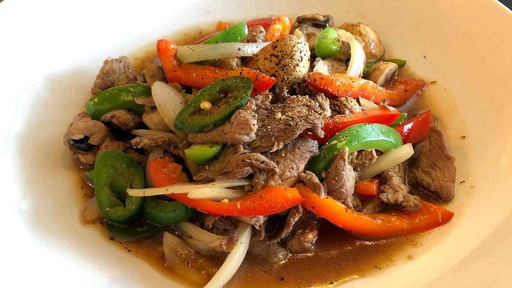 Thai Pepper Steak · Served spicy. Stir-fried steak with jalapeño, white onion, garlic, mushroom, and bell pepper.