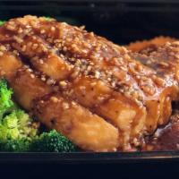 Garlic Red Snapper · Crispy red snapper fillet with garlic sauce; served over carrot and broccoli.