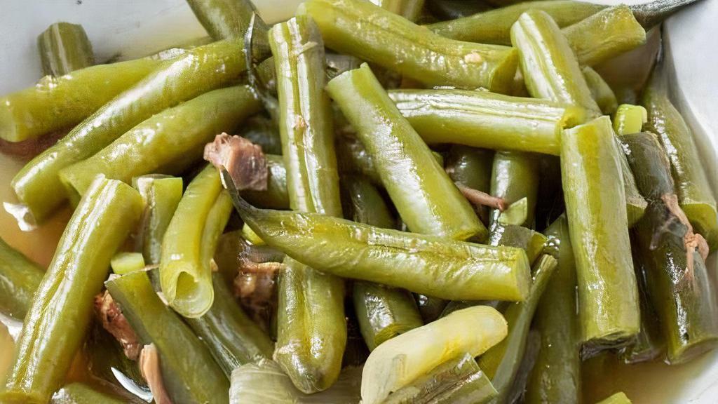 Tj'S Southern Green Beans · Slow cooked with smoked turkey until tender and tasty.