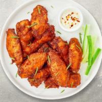 Classic Wings · Fresh chicken wings breaded and fried until golden brown.