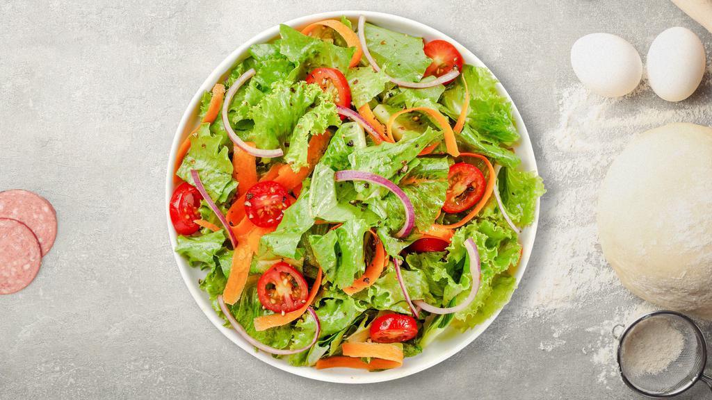 Garden Salad · (Vegetarian) Romaine lettuce, cherry tomatoes, carrots, and onions dressed tossed with your choice of dressing.