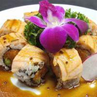Salmon Lover · Spicy salmon, cucumber, asparagus topped with torched salmon and yuzu dressing