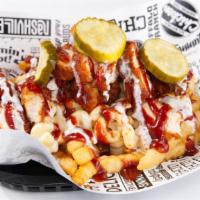 Bbq Mac Fries · Seasoned crinkle fries loaded with white cheddar mac and cheese, BBQ spiced chicken, and dri...