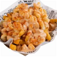 Mac Fries · Small seasoned fry loaded with white cheddar mac and cheese and topped with comeback sauce a...