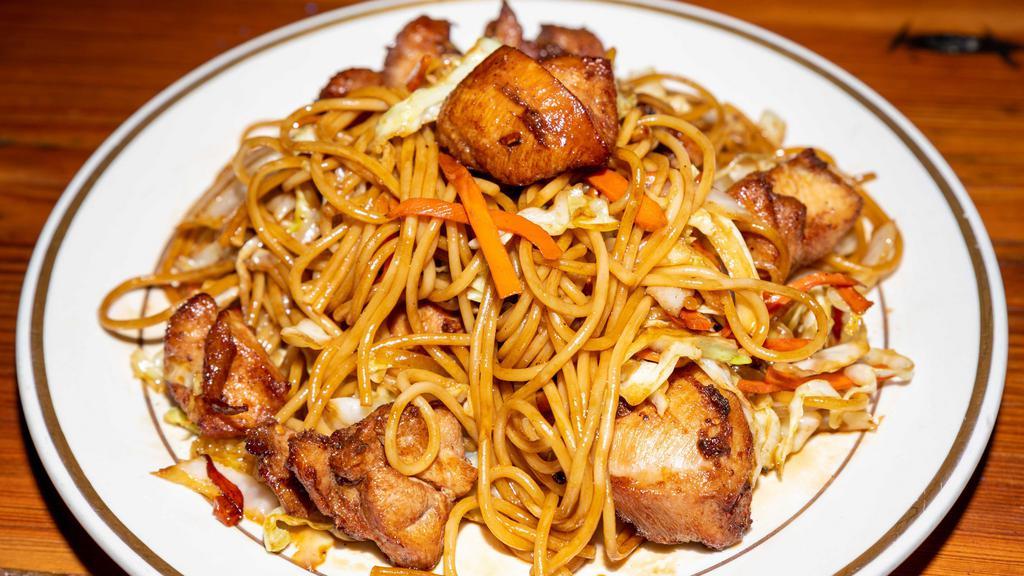 Chicken Chow Mein · Stir-fried noodles with cabbage onions and carrots.