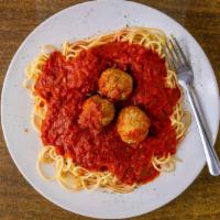 Spaghetti & Meatballs · Spaghetti topped in our homemade meatballs.