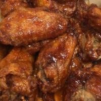 Wings - 10 Pcs Combo · Comes with fries and soft drink
Select up to two flavors: 
Barbecue
Buffalo
Garlic Parmesan
...