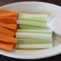 Veggie Sticks W/ Ranch Dressing · Sticks of carrots and celery.
